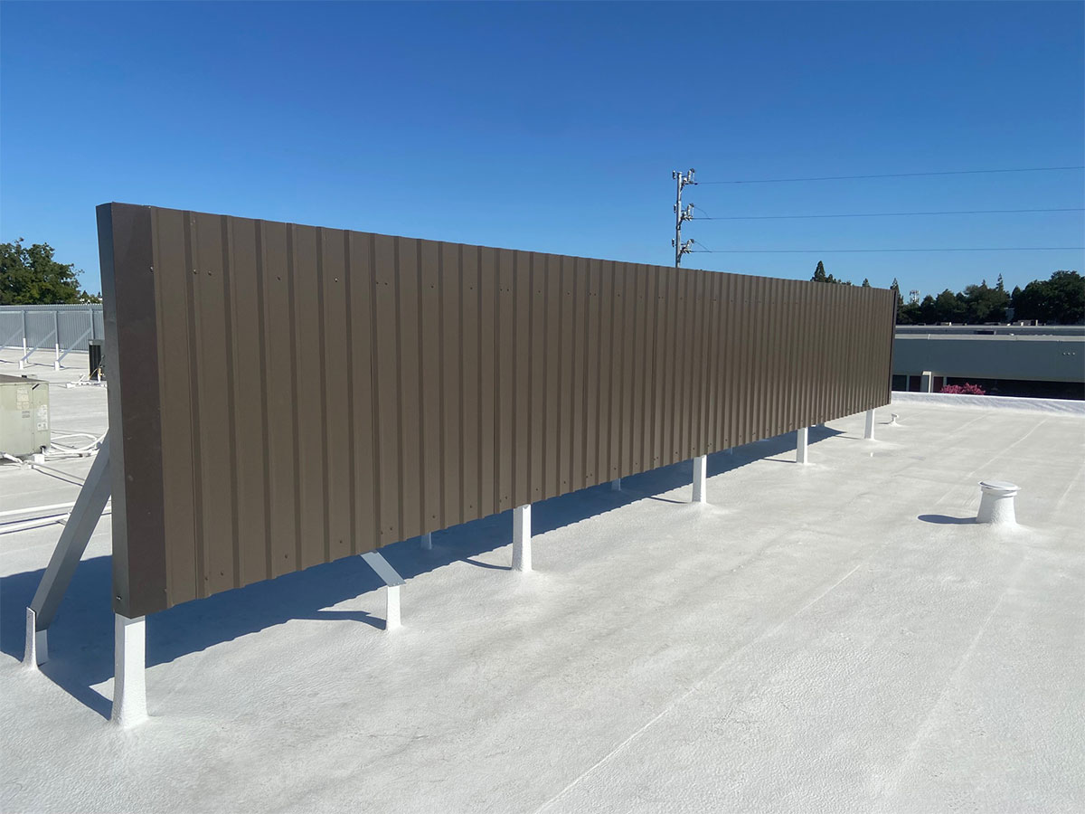 New Spray foam with silicone system with equipment site screen installed