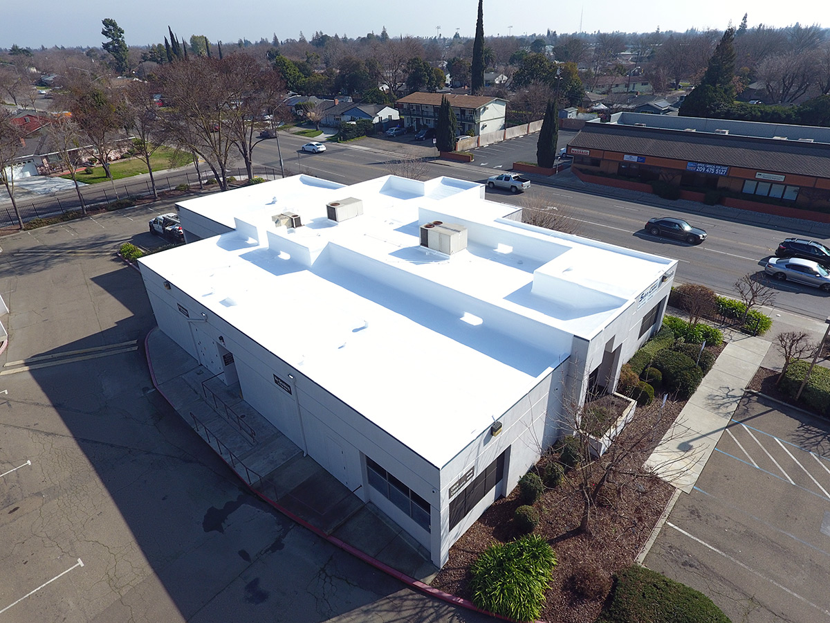Silicone roof restoration system over old spray foam roof 2