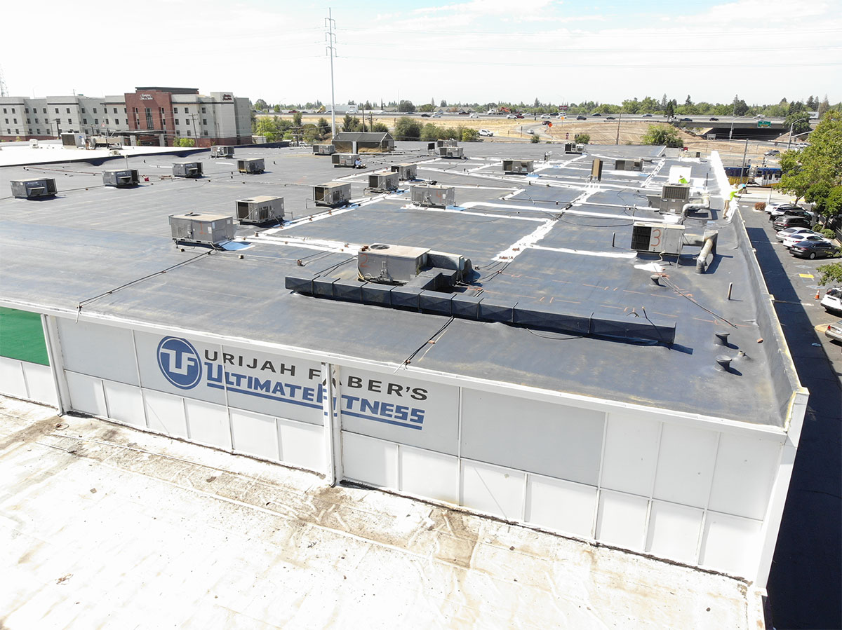 new spray foam roof with primer installed 1