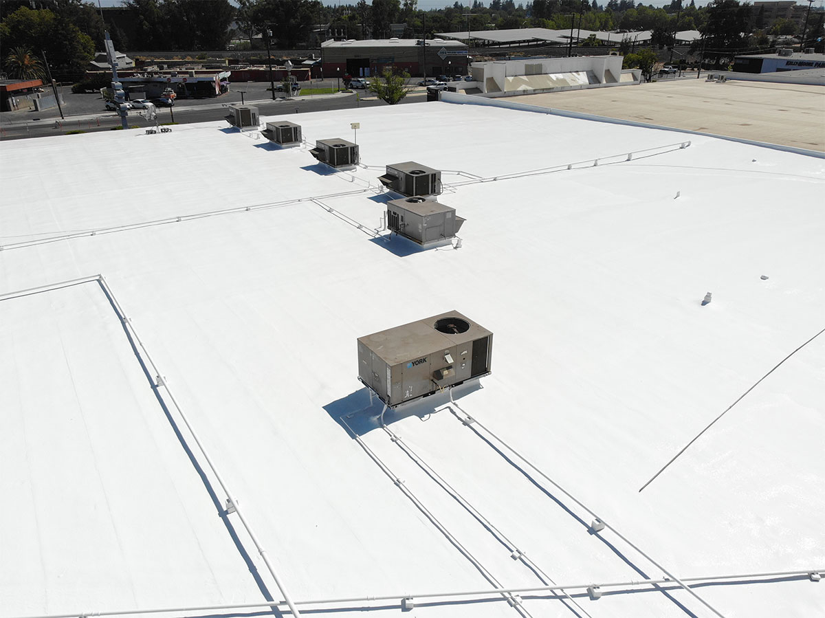 new spray foam roof with primer installed 2