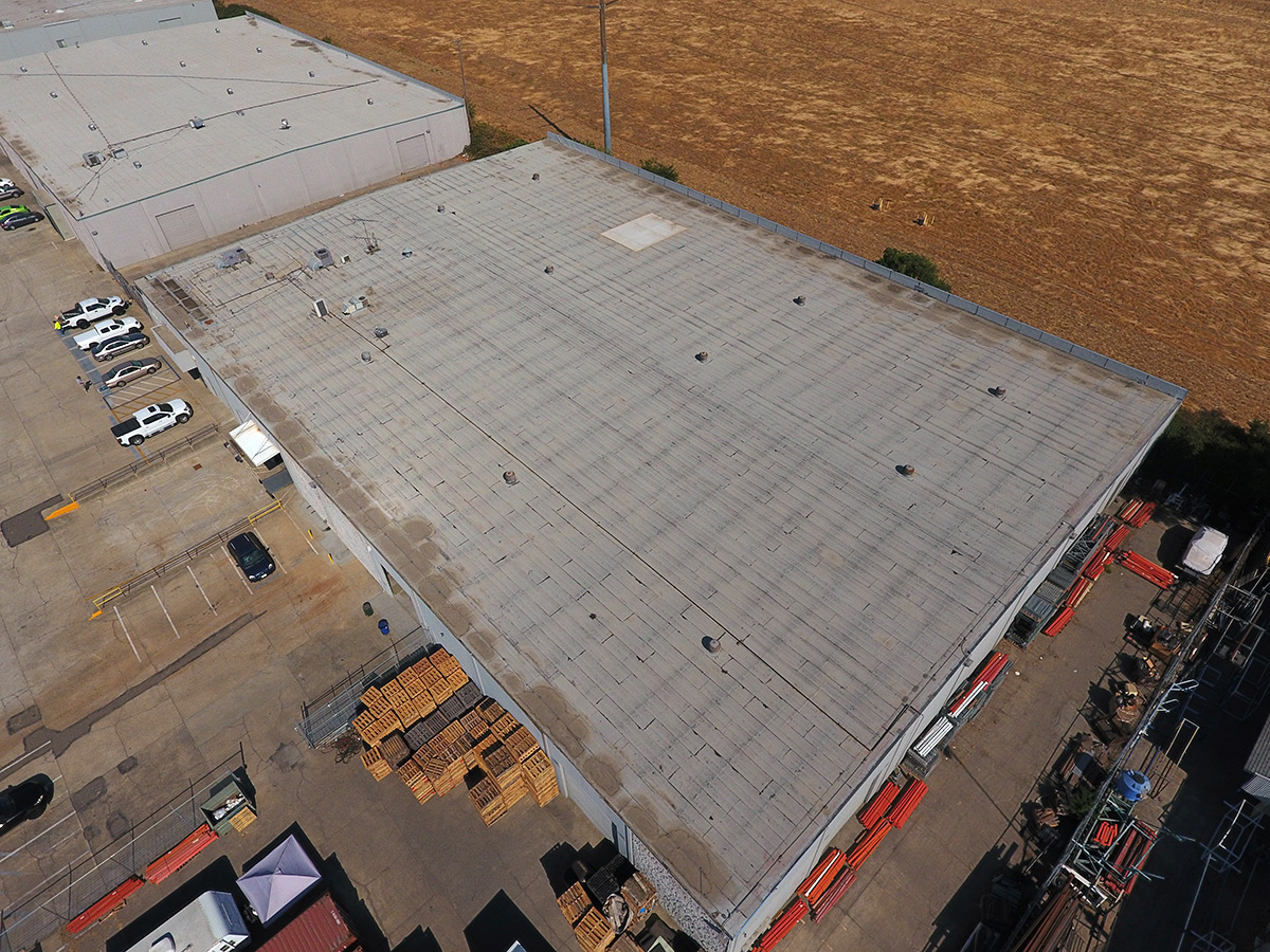 spray foam roofing over asphalt 1
