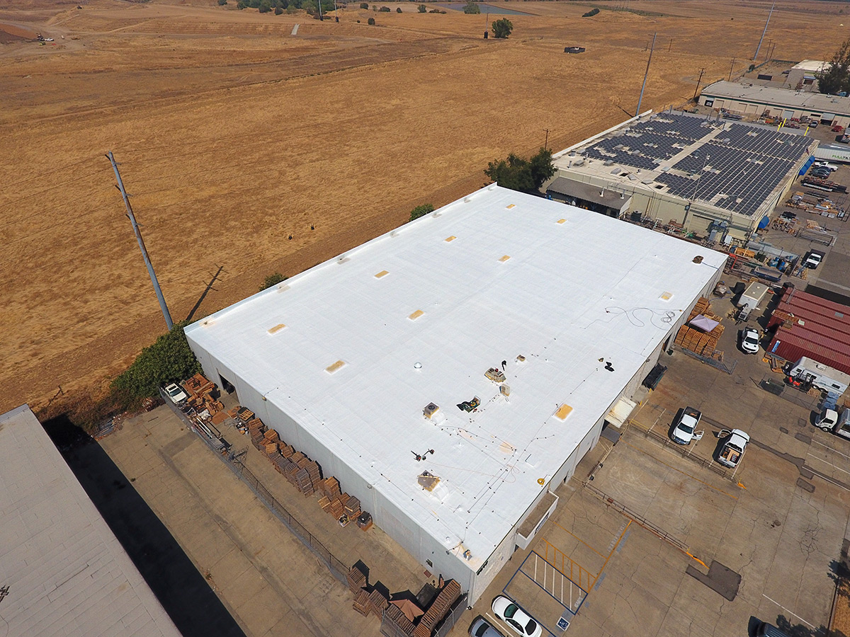 spray foam roofing over asphalt 2